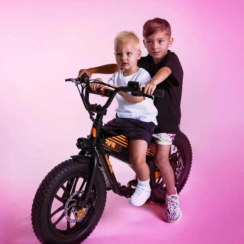 Flight Risk FR101 compact electric e-bike for kids aged 4-7 with 250W motor, disc brakes, and customizable stickers