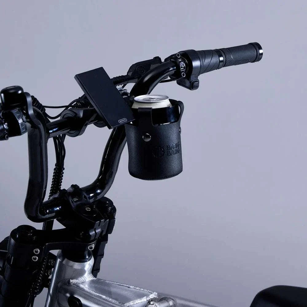 Bang Bang Bike Cup Holder mounted on bicycle handlebar holding a coffee cup securely