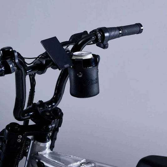 Bang Bang Bike Cup Holder mounted on bicycle handlebar holding a coffee cup securely