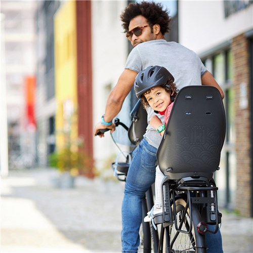 Urban Iki Rear Seat Easyfix child bike seat mounted on rear luggage rack with 5-point safety harness and integrated lock